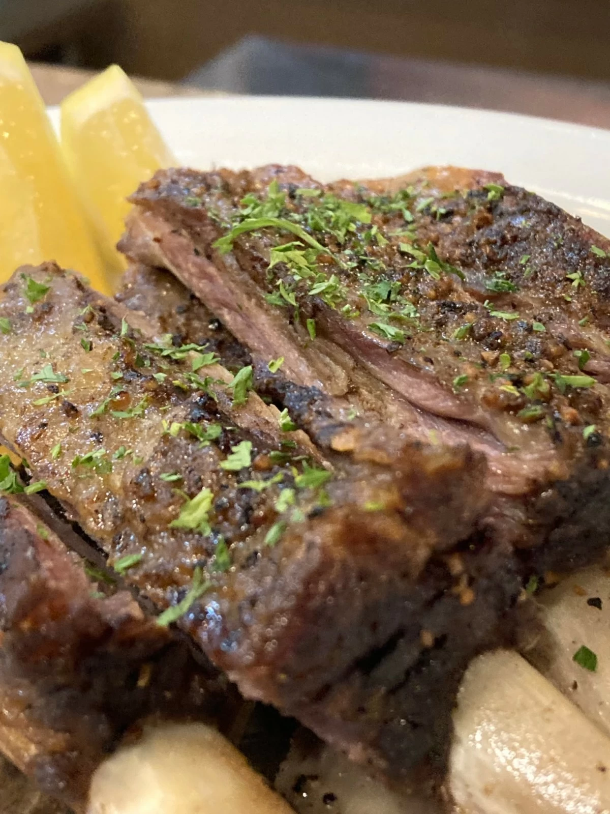 SHORTRIBS Slow roasted Australian lamb shortribs, garlic, pepper, sea salt, olive oil, and fresh lemon