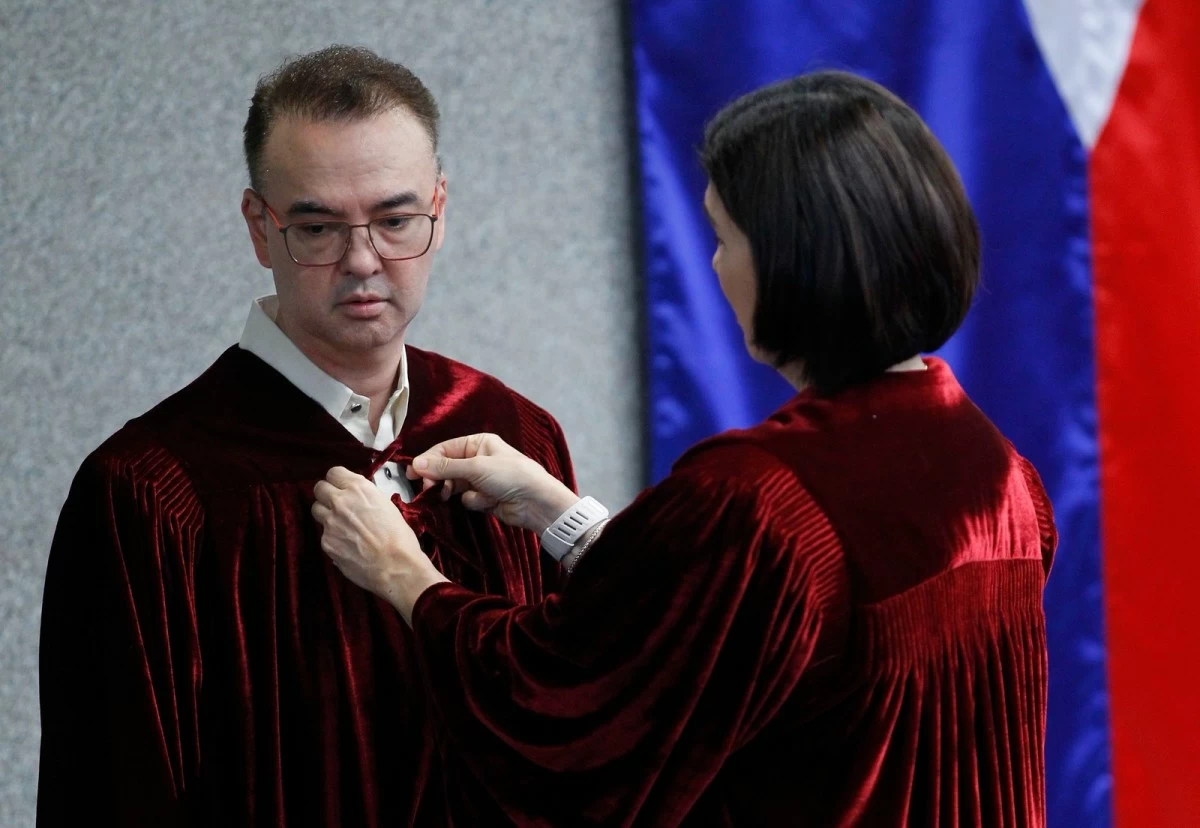 Senators, led by Senate President Alan Peter Cayetano, take their oath as the impeachment court convenes at the Senate in Pasay City on Monday, May 18, 2026, for the impeachment trial of Vice President Sara Duterte. (Mark Balmores)