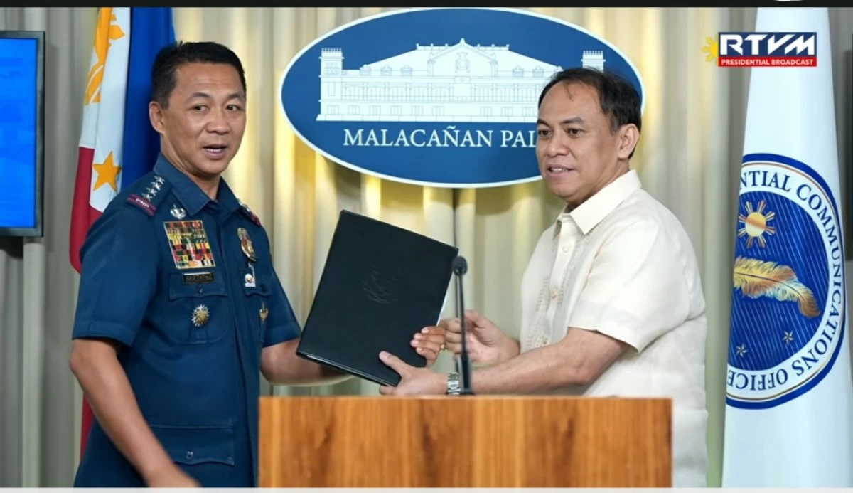 PNP chief gen. Jose Melencio C. Nartatez, Jr turns over to DOJ Secretary Fredderick Vida the result of the police investigation into the Senate gunfire incident on May 13, 2026. 