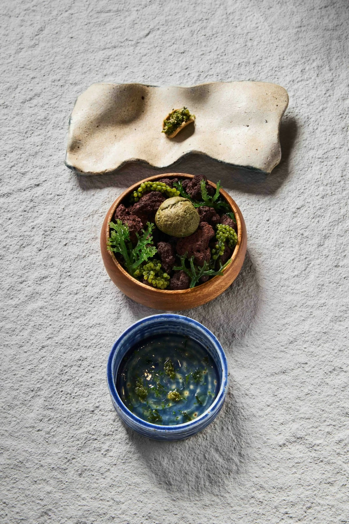 RIVER RUNS One of the evening’s standout dishes, 'River,' unfolds in stages with river prawn, tamarillo, basil, and a creamy chupe de camarón with ulang served alongside toasted bread. (Photo: Fern Dy)