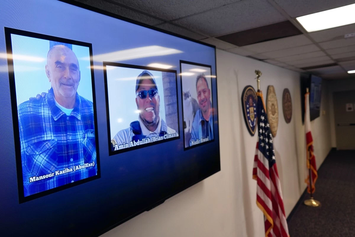 Photos of the three victims at the Islamic Center of San Diego are displayed after a news conference in San Diego, Calif., Tuesday, May 19, 2026. (AP Photo/Ty ONeil)