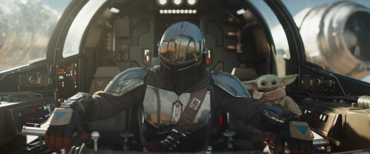 (L-R) Mandalorian (Pedro Pascal) and Grogu in Lucasfilm's THE MANDALORIAN AND GROGU. Photo courtesy of Lucasfilm. © 2025 Lucasfilm Ltd™. All Rights Reserved.