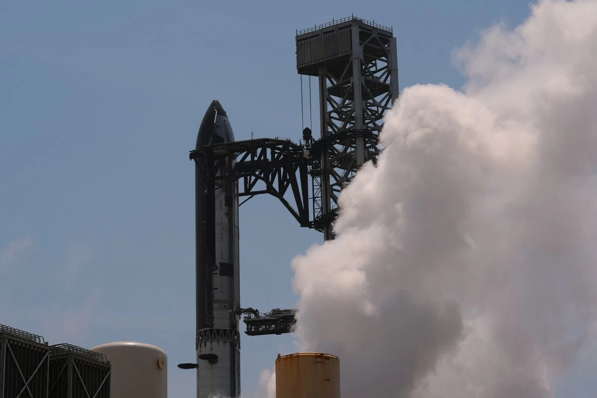 SpaceX's latest version of its mega rocket Starship is prepared for a test flight from Starbase, Texas, Wednesday, May 20, 2026. (AP Photo/Eric Gay)