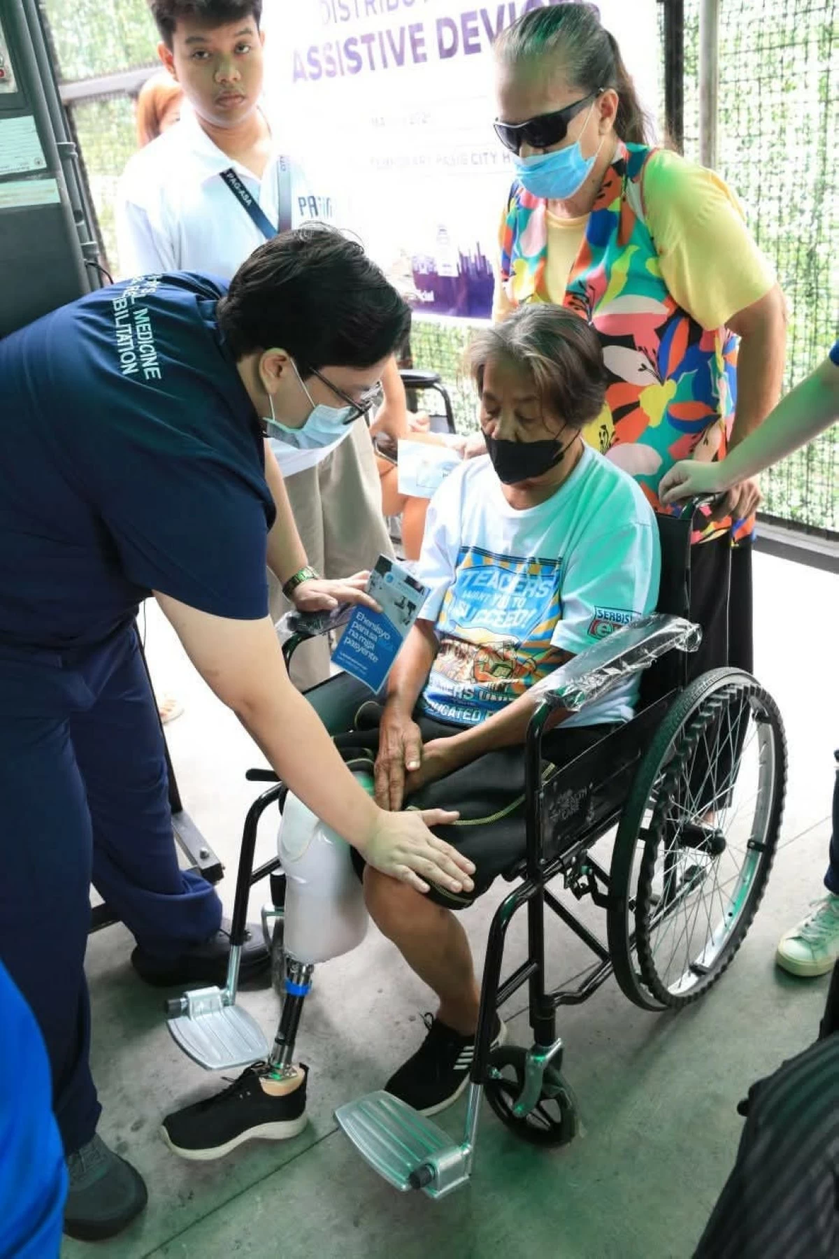 57 persons with disabilities (PWDs) receive free assistive devices such as hearing aids, prosthesis, and ankle-foot orthosis (below-the-knee and above-the-knee) during the distribution at the Temporary Pasig City Hall on May 19. (Photo from Pasig PIO)