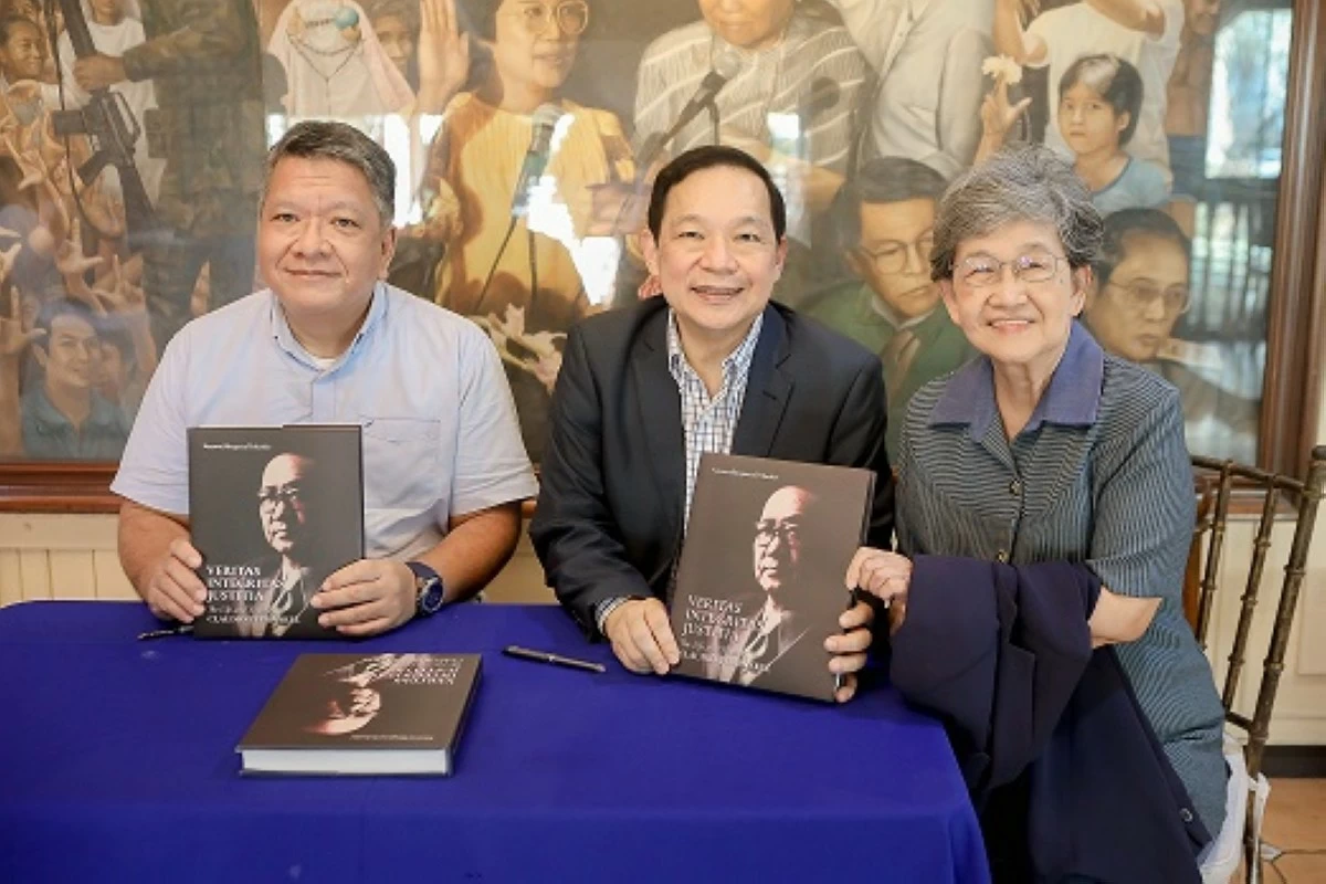 Co-authors C. Horatius Mosquera and Manuel A. J. Teehankee with Chinese Filipino civic leader Teresita Ang See.