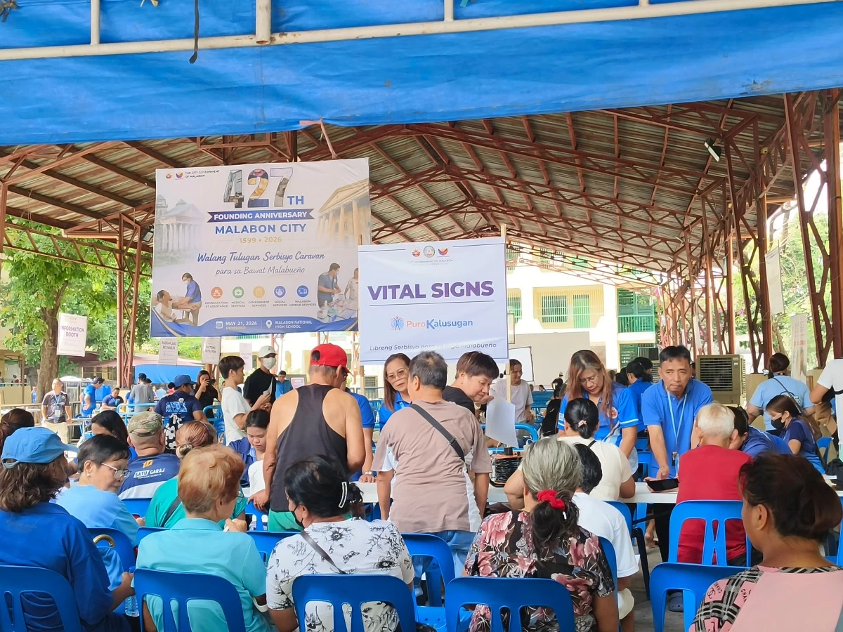Residents line up for free services during the Walang Tulugan Serbisyo Caravan in celebration of Malabon City’s 427th Founding Anniversary on Thursday, May 21. (Photo by Hannah Nicol/MANILA BULLETIN)