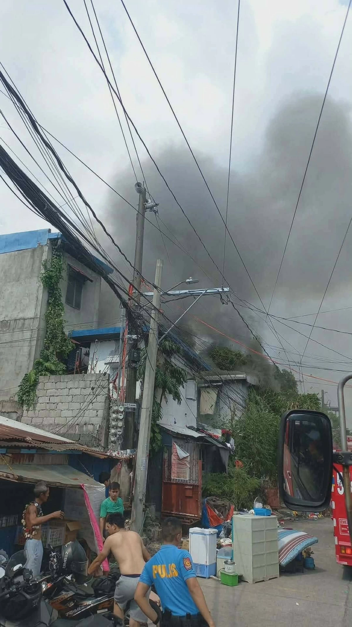 Fire engulfs a residential area along San Ildefonso Street in Torres Village, Barangay Nagkaisang Nayon, Novaliches, Quezon City on Thursday afternoon, May 21, 2026.(Photo courtesy of Philippine Emergency Alerts)