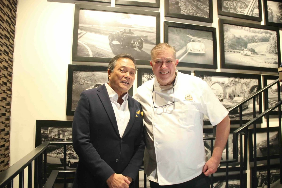 PRIME PARTNERS Tony Boy Escalante and Chef Tony Biggs share a moment during Prime Roast Night at Antonio’s at PGA Cars (Photo: Antonio's)