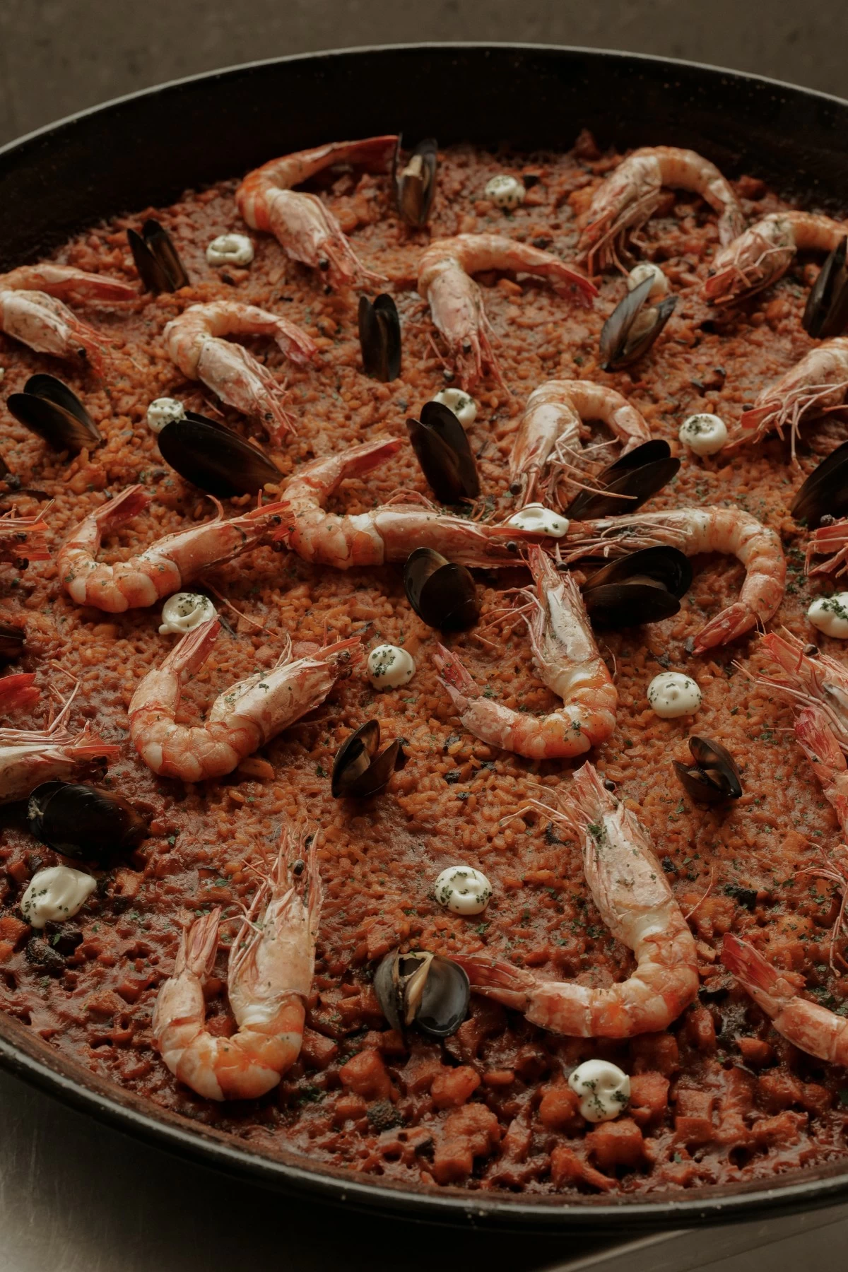 Chef Alvaro Romero Abreu-Raya’s seafood paella, loaded with tiger prawns and fresh seafood, was created with both the local palate and Northern Spanish tradition in mind—rich, comforting, and meant to be shared around the table.