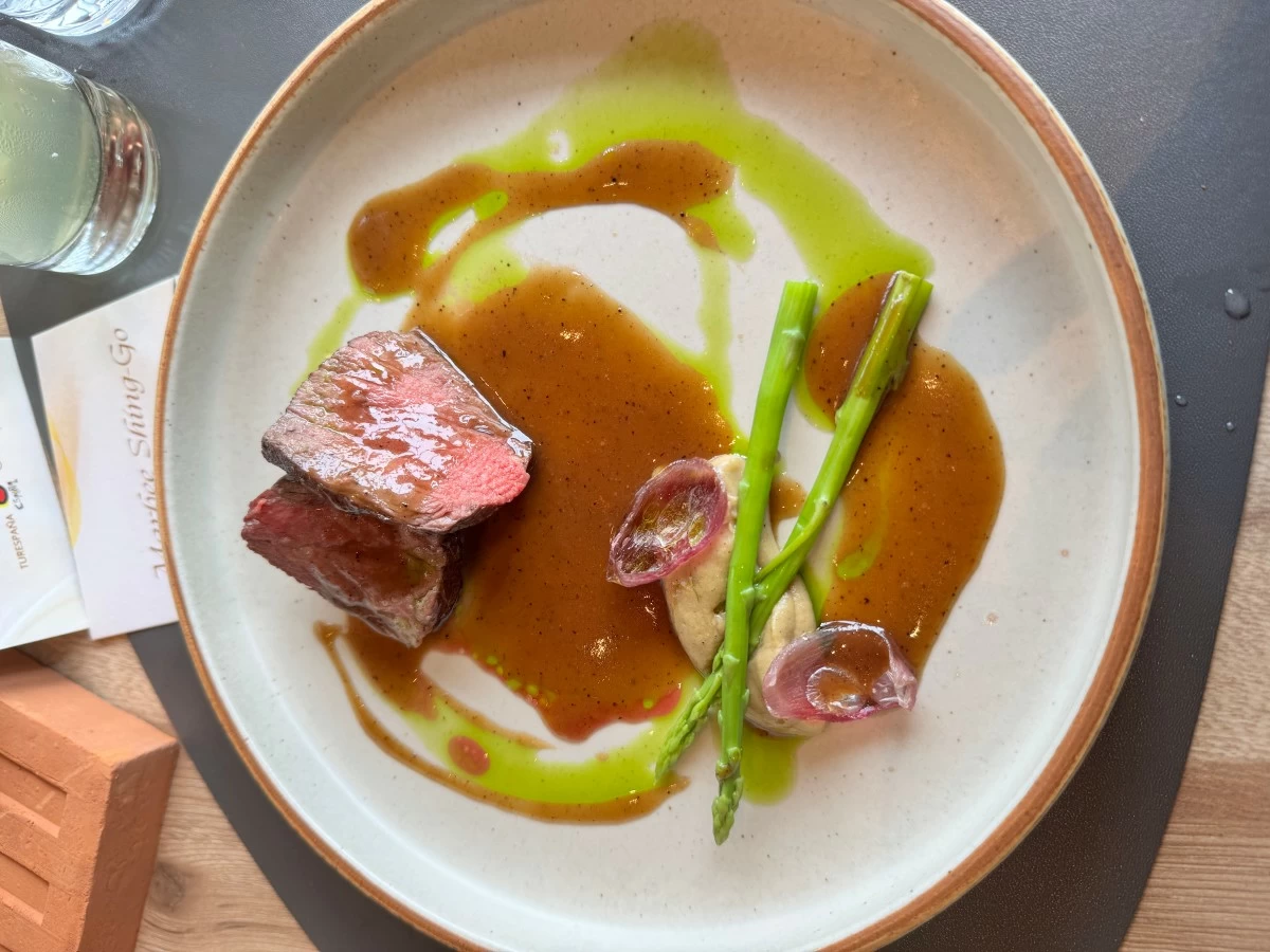 Chef Alvaro's solomillo de vaca (beef tenderloin with a delicious roasted eggplant puree and Rioja sauce)