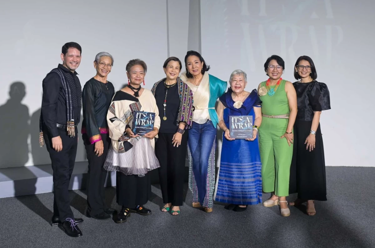 WEAVING LEGACY (From left) FEU Center for the Arts senior director Martin Lopez, Gwenn Galvez, Francine Medina Marquez, FEU trustee Gianna Montinola, Ditta Sandico, Gayle Zialcita, FEU vice president for Corporate Affairs Rowena Capulong Reyes, and FEU Publications manager Melany Caperal (Photo: FEU)