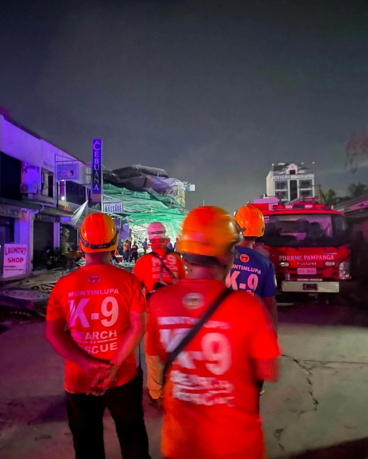 The Muntinlupa K9 team at the site of the collapsed structure in Angeles City, Pampanga on May 24 (Photo from Muntinlupa K9 Search and Rescue)