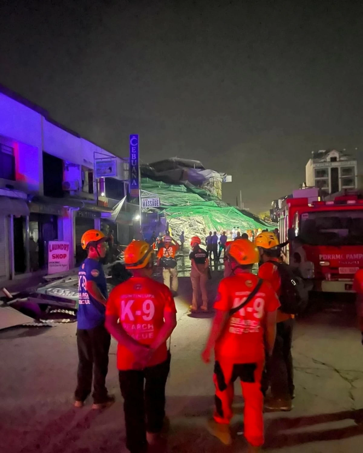 The Muntinlupa K9 team at the site of the collapsed structure in Angeles City, Pampanga on May 24 (Photo from Muntinlupa K9 Search and Rescue)