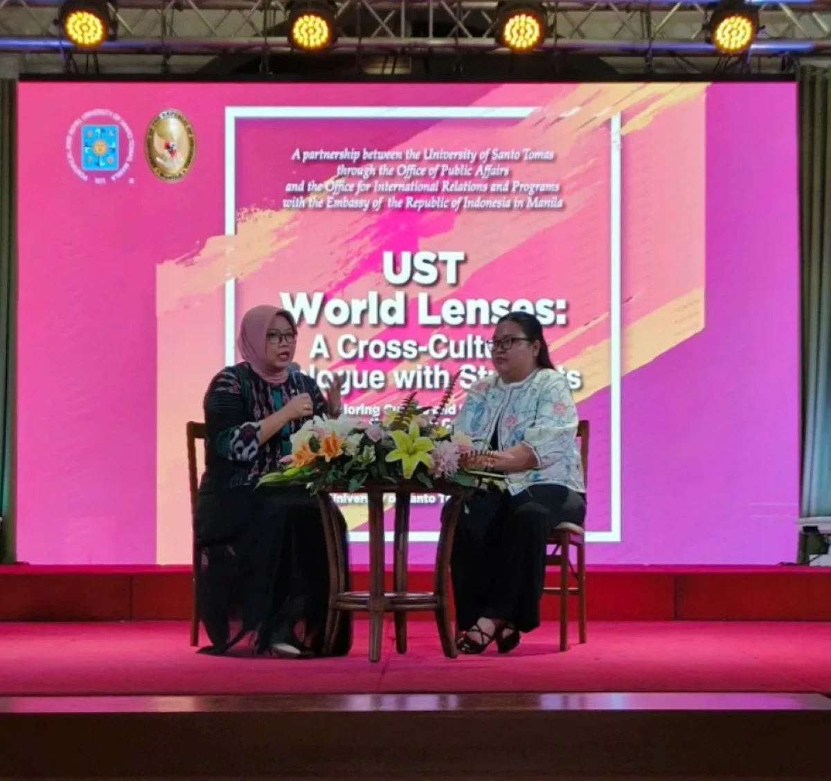 The Embassy of Indonesia in Manila’s Minister Counsellor for Culture and Information Avi Dewani Sari Harahap (answers questions from the students in an open forum moderated by the UST Office of Public Affairs assistant director Katherine Patrice Sibug
