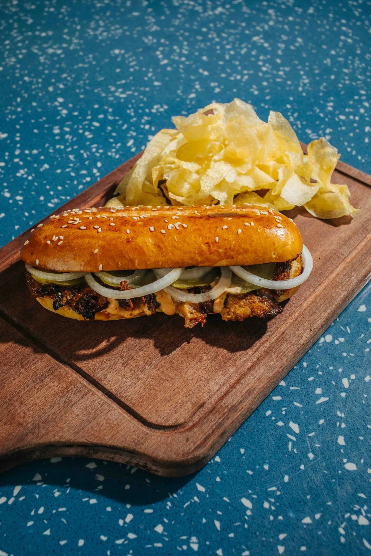 HOLY RIBWICH Billy’s Holy Ribwich layers grilled chashu, onions, pickles, and horseradish sauce on soft shokupan bread (Photo: Arabella Paner)