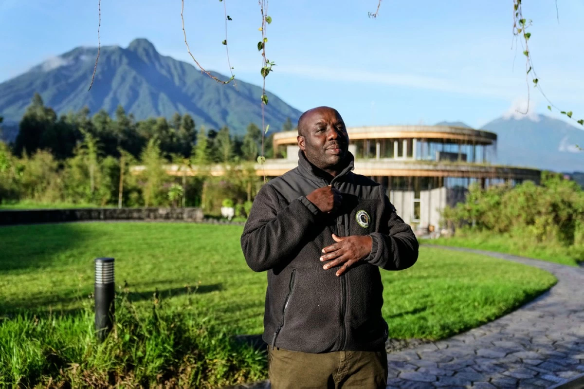 Deogratias Tuyisingize, a biodiversity researcher with the Dian Fossey Gorilla Fund, speaks during an interview in Volcanoes National Park, Kinigi, Rwanda, Thursday, March 19, 2026. (AP Photo/Brian Inganga)