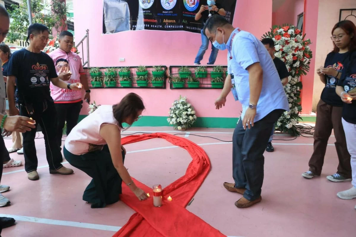 Mayor Emi Calixto-Rubiano leads the candlelighting ceremony during the AIDS Candlelight Memorial 2026. (Photo courtesy Pasay PIO)
