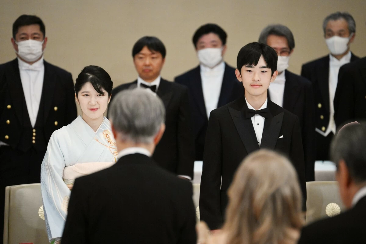 Japan's Prince Hisahito, the son of Crown Prince Akishino and Crown Princess Kiko, and Princess Aiko, the daughter of Emperor Naruhito and Empress Masako, attend a banquet for Philippine President Ferdinand Marcos Jr. and his wife at the Homei-Den hall of the Imperial Palace in Tokyo on Wednesday. (Pool photo)
