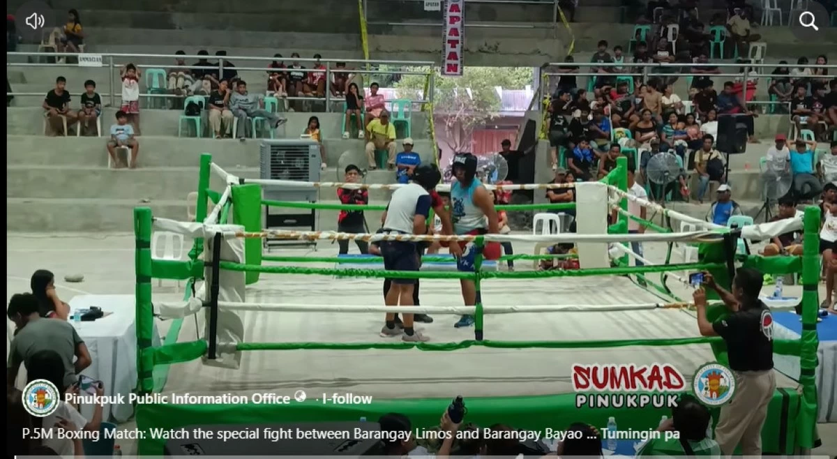 BARANGAY officials in Pinukpuk, Kalinga 'fight' to earn P500,000 project money during the recent Gimpong Festival.   
