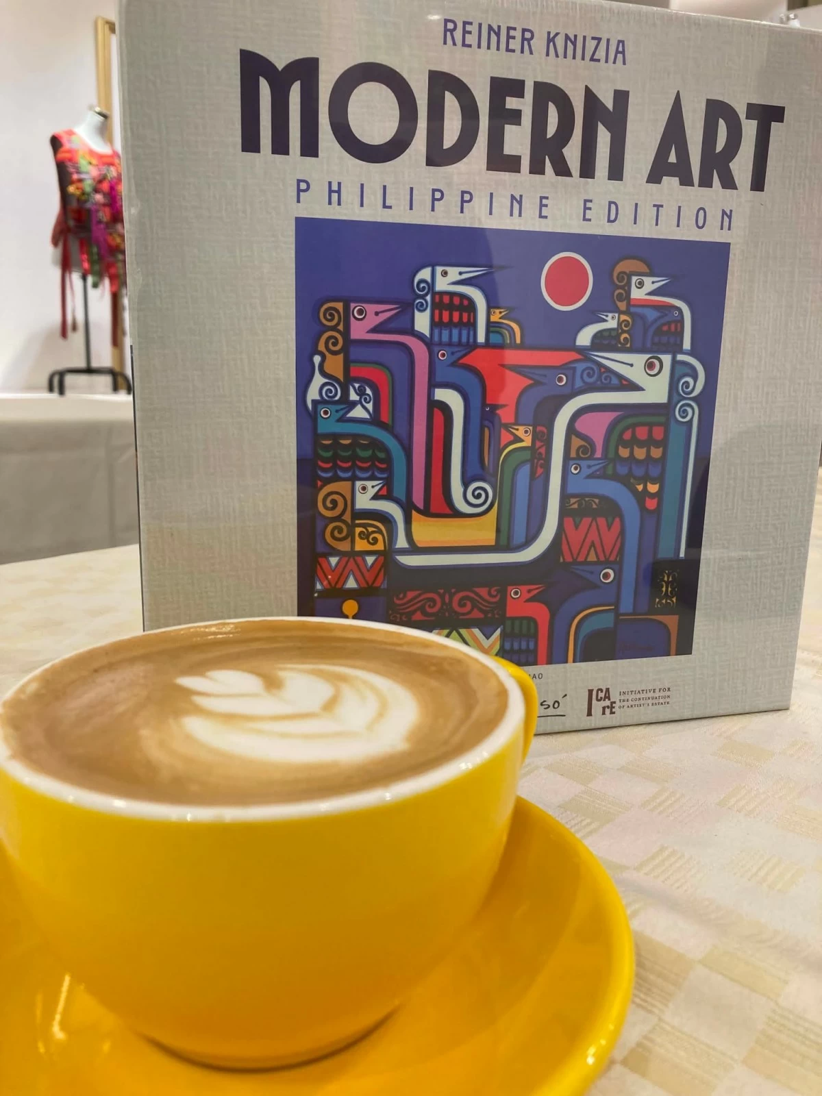 A COZY AFTERNOON Enjoying a latte from Fundacion Sanso's cafe during an afternoon game