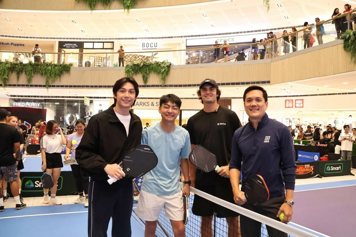 Fil-Canadian National Champion and PPA Tour athlete MacKonner Dy together with globally recognized pickleball star, PPA Champion and former World no.3 in Mixed Doubles James Ignatowich and Toby’s Sports President Toby Claudio Jr. for the Toby’s Super Series at SM North EDSA during the SM Active Hub Anniversary