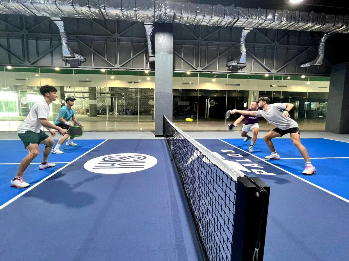 Pickleball players and content creators from lifestyle collective The Friday Crew at the pickleball court in Four E-Com