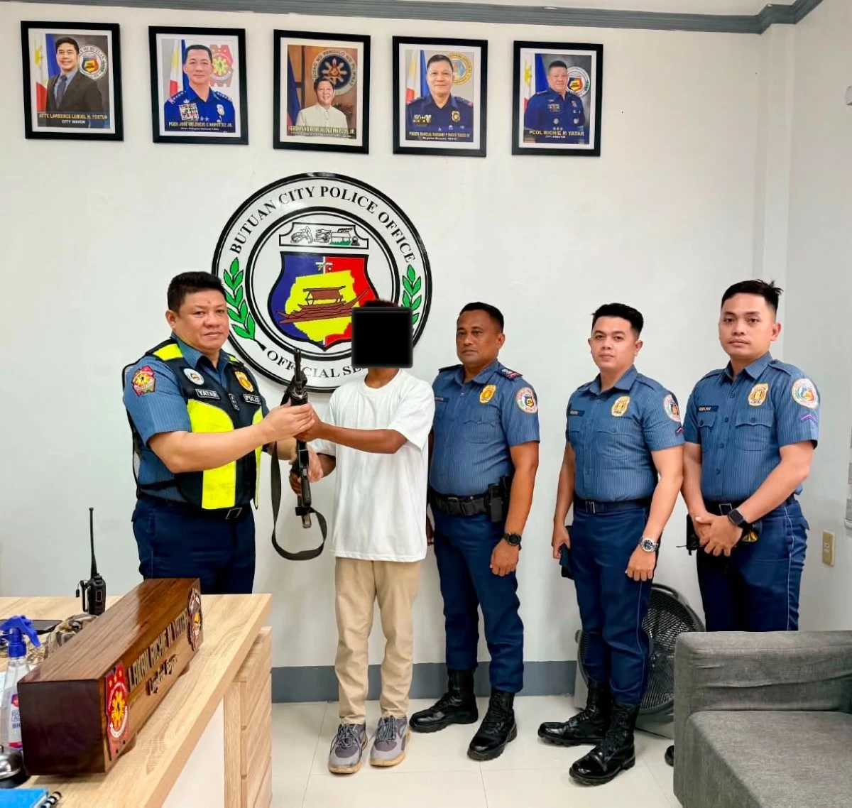POLICE receive an NPA surrenderer in Butuan City. (Butuan City Police Offuce FB)