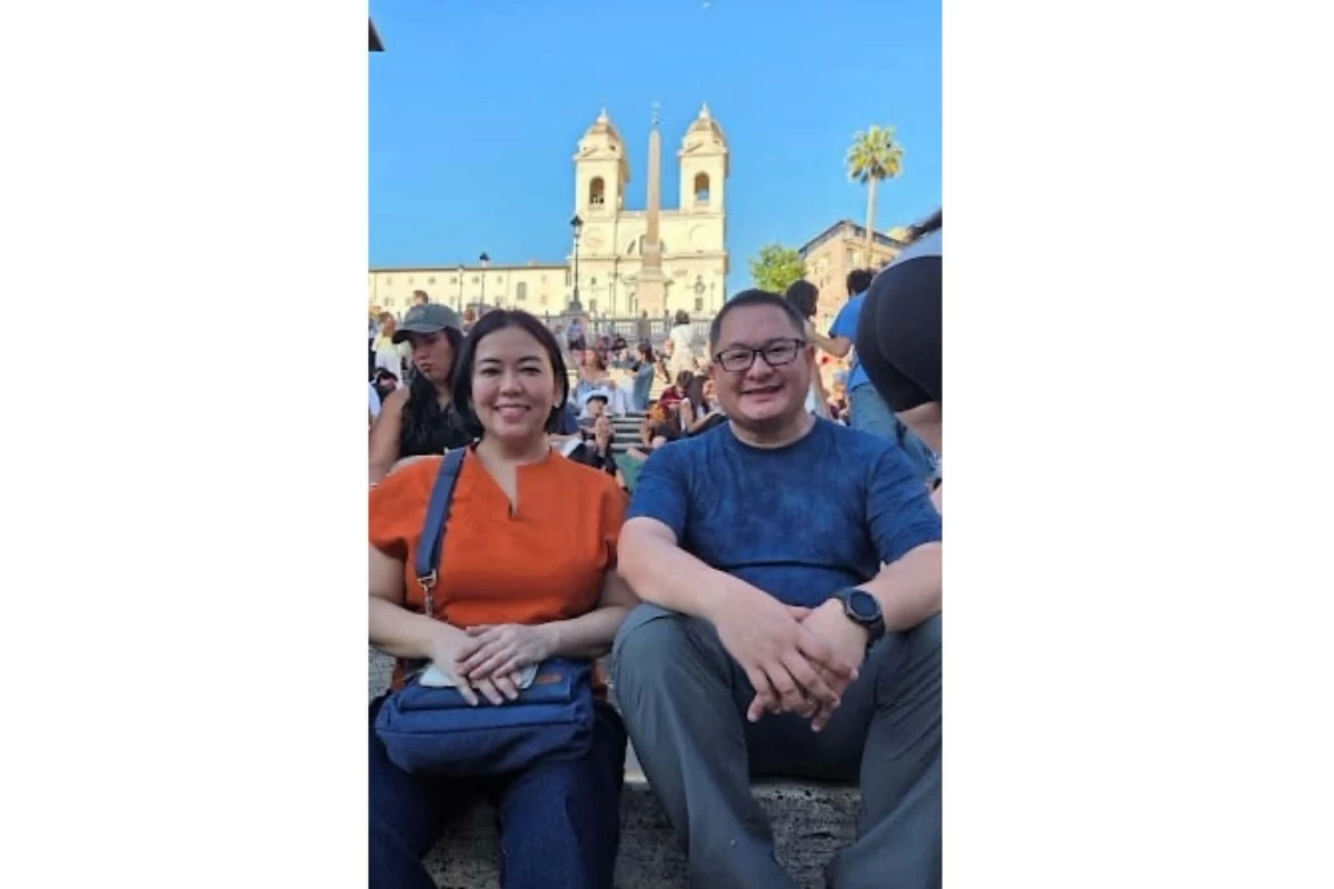 The author and his wife sitting at the famed Spanish steps.
