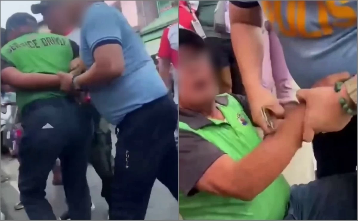 A police officer handcuffs a driver in Taguig on June 2 (Screenshots from Tenants Ray Rice's video on Facebook) 