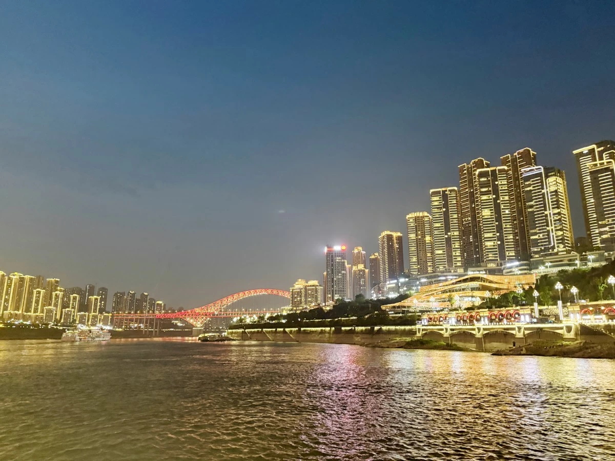 YANGTZE AT NIGHT - A view of Chongqing from the Yangtze during the Two Rivers Night Cruise.
