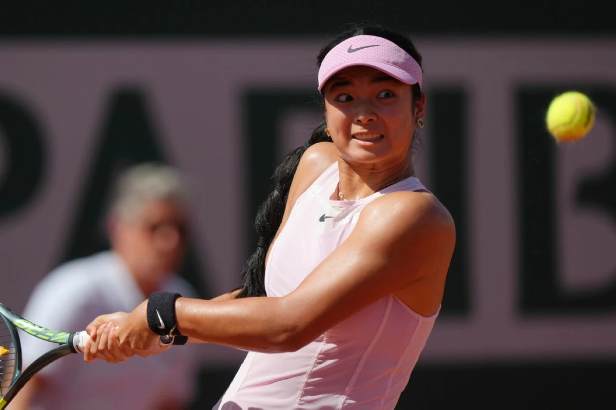 Alexandra Eala of Philippines returns to Iva Jovic of the U.S. during their first round men's singles tennis match at the French Open tennis tournament in Paris, Tuesday, May 26, 2026. (AP Photo/Aurelien Morissard)