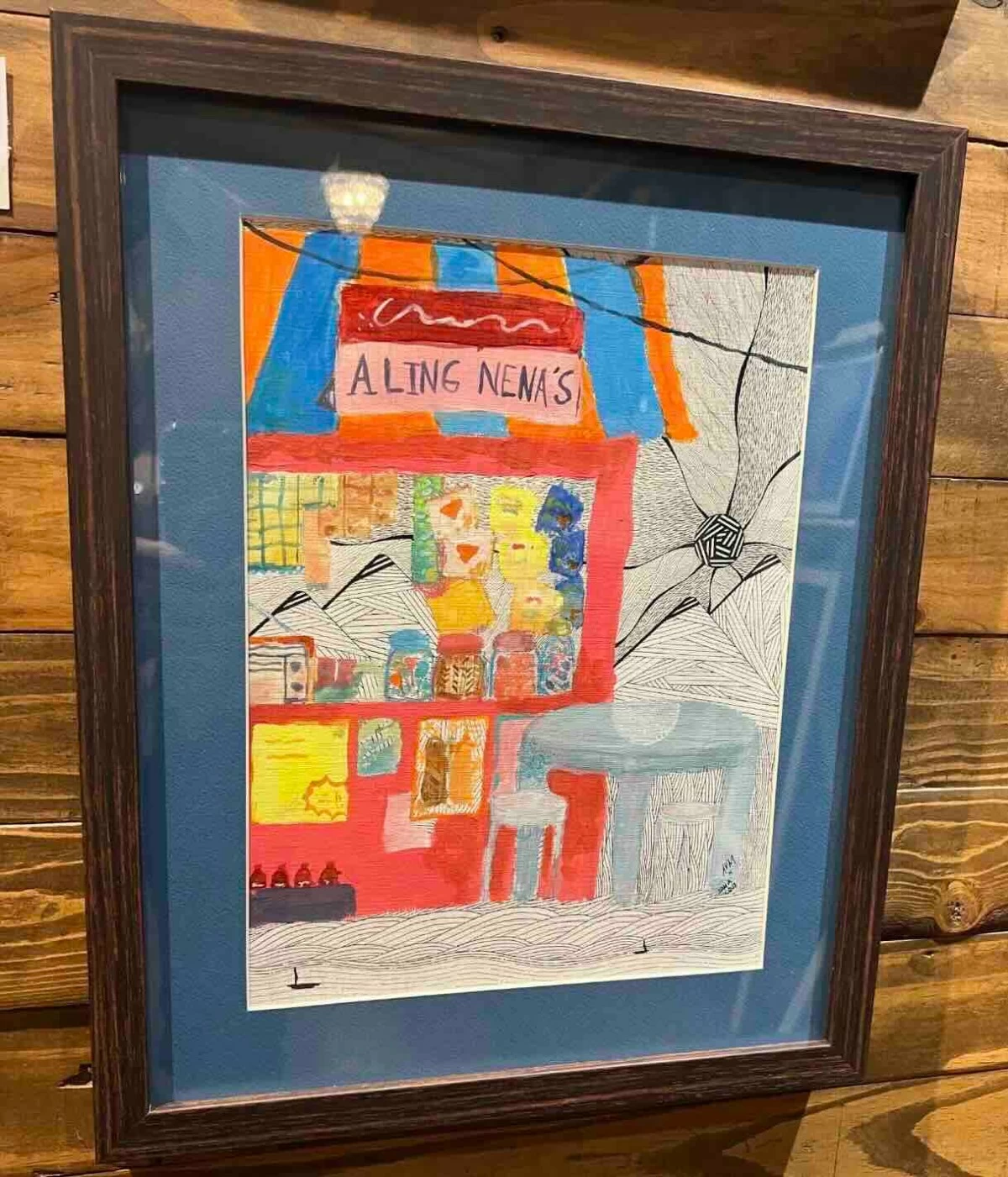 EVERYDAY COLORS Aaron Mempin and Zaha Cruz’s collaborative painting of a neighborhood sari-sari store blends contemporary geometric abstraction with a familiar Filipino street scene, celebrating everyday local life through two distinct artistic styles (Photo: Aaron Mempin)