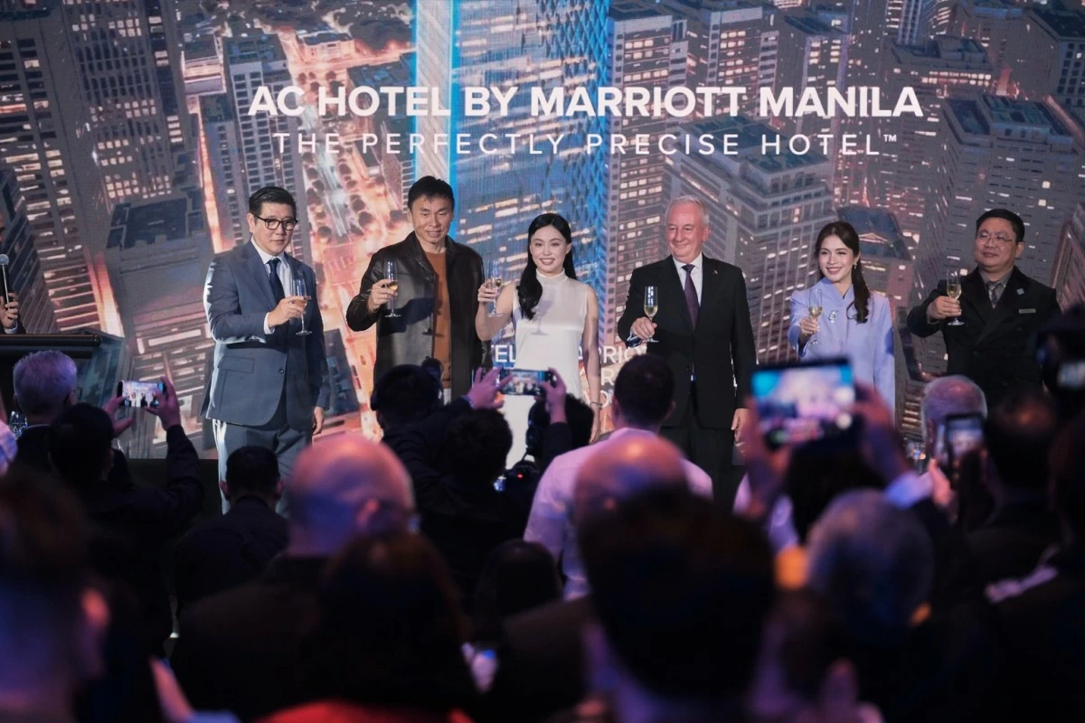 AC Hotel by Marriott Manila general manager Melvyn Angeles, founder and chairman of ASYA architect Albert Yu, interior design director and managing director of AC Hotel by Marriott Manila Clarice Yu-Sy, Marriott International area general manager for the Philippines Bruce Winton, director of Sales Ellie Alarcon, and financial controller Jojit Padullo raise a toast in celebration of the hotel’s official launch.
