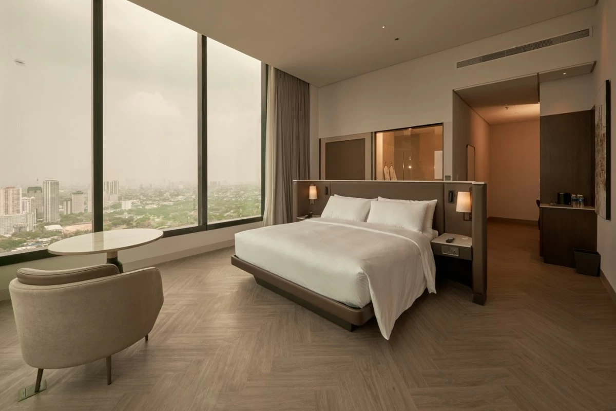 Deluxe Suite designed with spacious contemporary interiors and understated sophistication across an expansive 54 sqm layout.