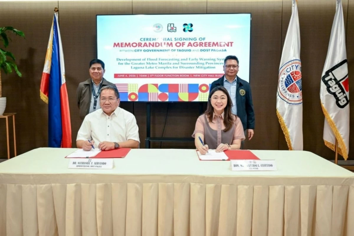 Taguig Mayor Lani Cayetano and DOST-PAGASA Administrator Dr. Nathaniel Servando during the signing of the memorandum of agreement (Photo from the Taguig City government) 