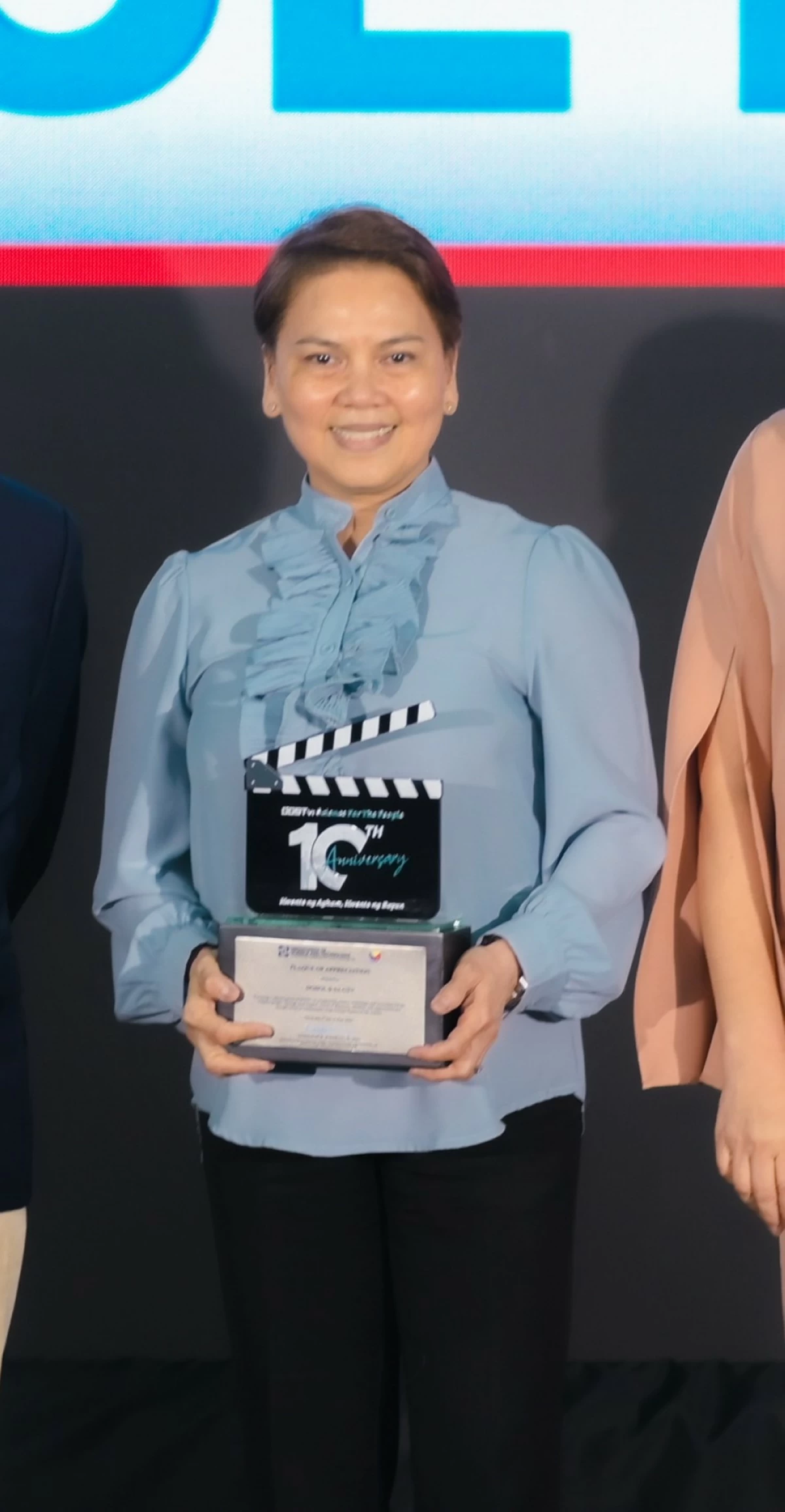 DZBB news manager Rowena Salvacion
