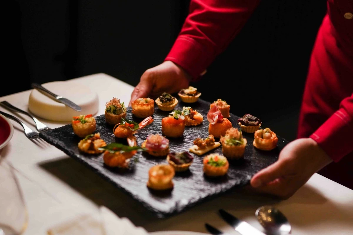 SMALL BITES A selection of Carmelo's catering canapés, from pâté toasts and salmon cornettes to Beef Wellington tarts, showcases the steakhouse's growing private dining offerings (Photos: Carmelo's) (Photo: Carmelo's)