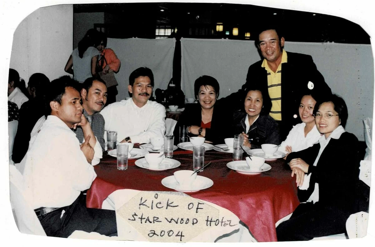 Olivia and her team in 2004