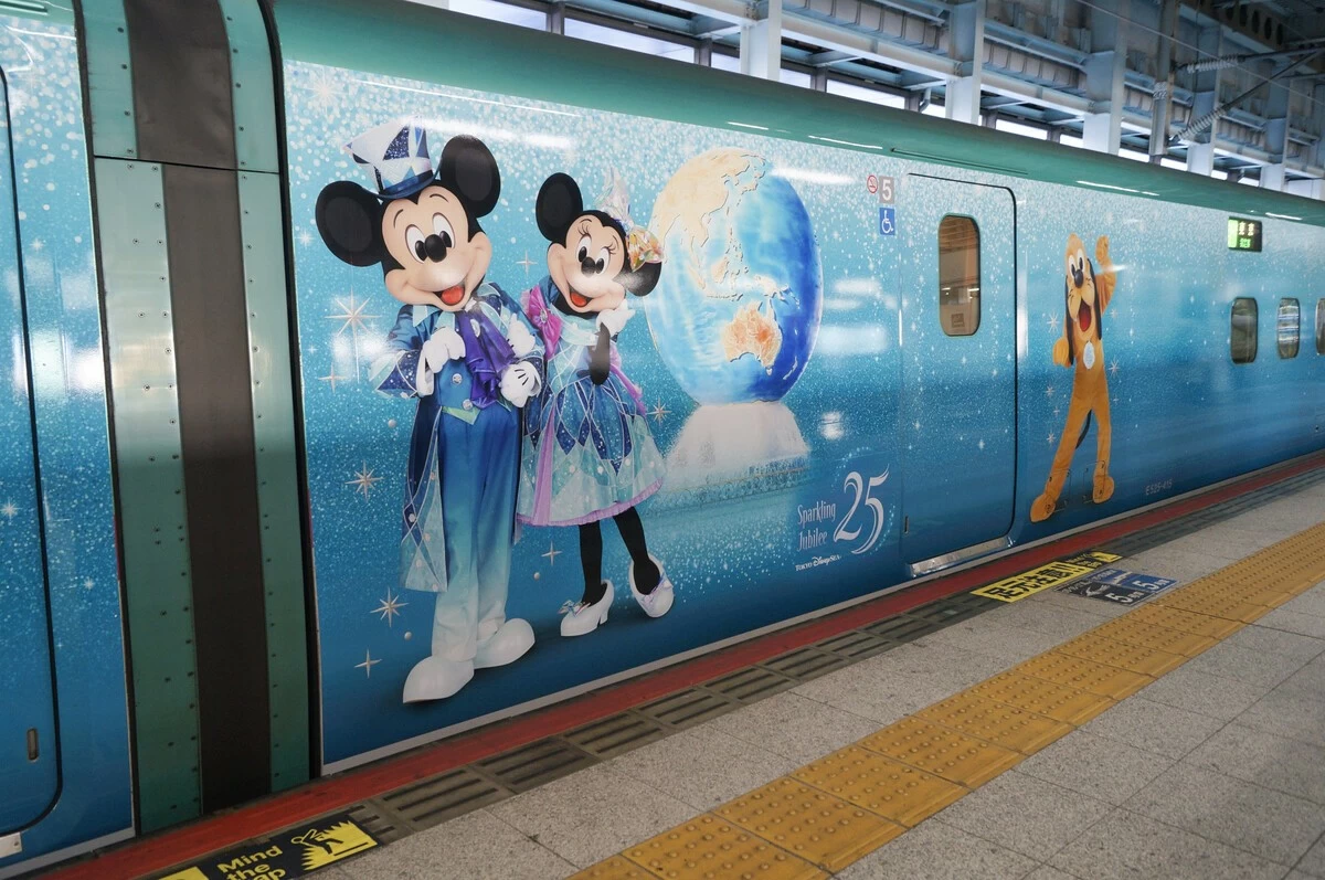 A specially painted Shinkansen train, themed on the 25th anniversary of Tokyo DisneySea, at JR Sendai Station in Miyagi Prefecture.