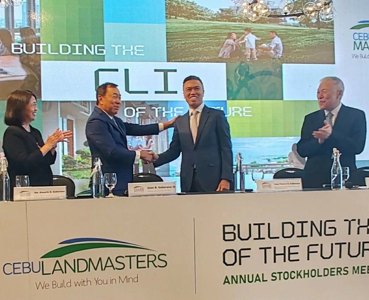 Passing the torch of leadership to Jose Franco Soberano at the annual stockholders' meeting (Photo: Carla Mortel)