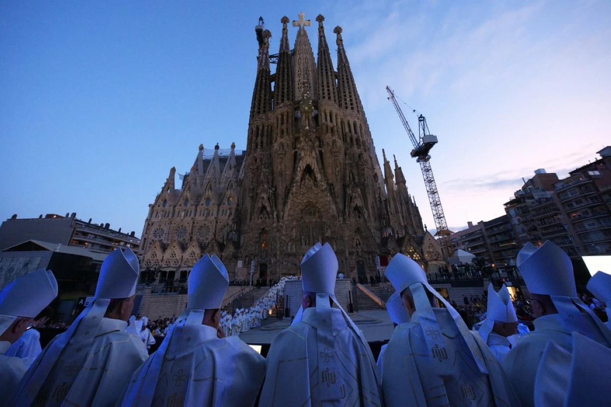 Priests attend the inauguration of the Tower of Jesus Christ at the Basilica of the Sagrada FamÌlia in Barcelona, Spain, Wednesday, June 10, 2026. (AP Photo/Emilio Morenatti)