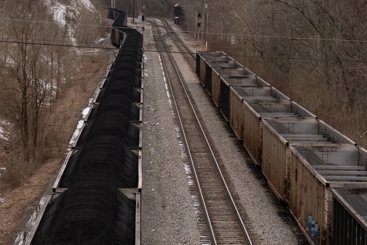 A train with coal pauses on the tracks in Grafton, W.Va., March 18, 2026. (AP Photo/Carolyn Kaster, File)