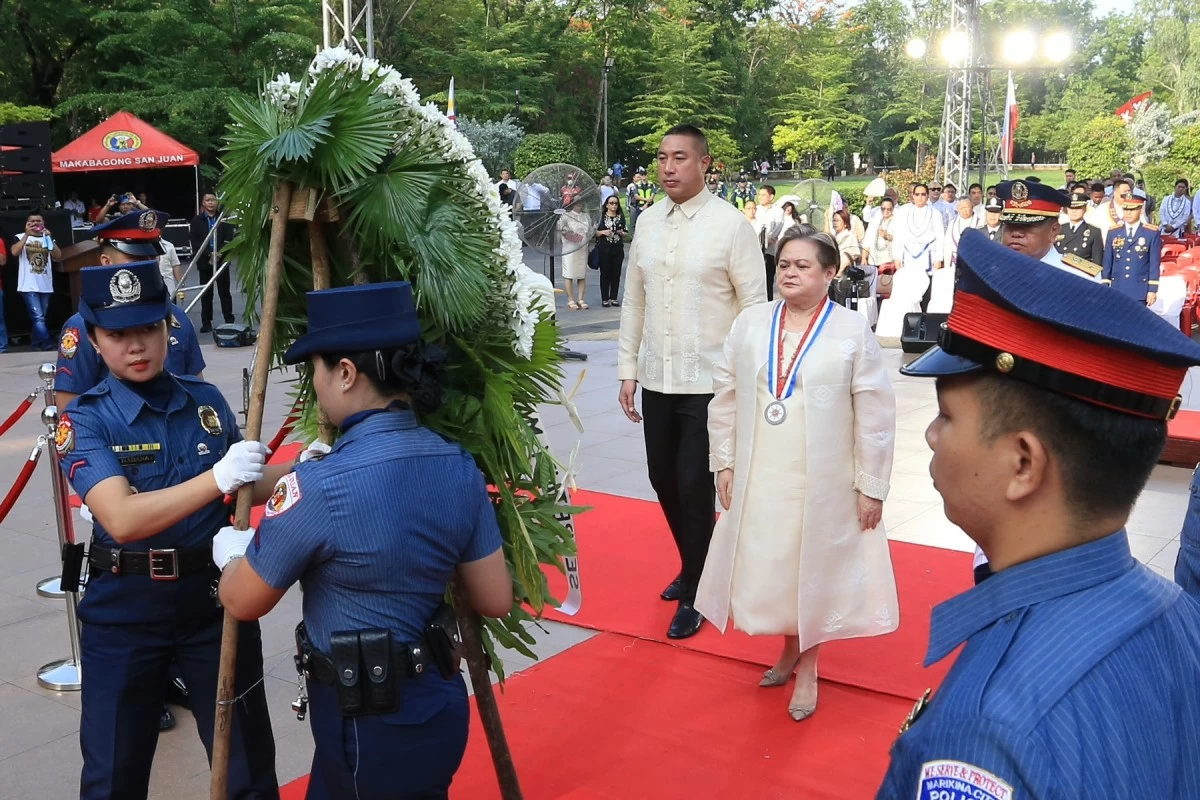 Department of Foreign Affairs Secretary Ma. Theresa Lazaro and San Juan City Mayor Francis Zamora lead the 128th Philippine Independence Day rites held at the historic Pinaglabanan Shrine on Friday, June 12. (Photos by Santi San Juan)