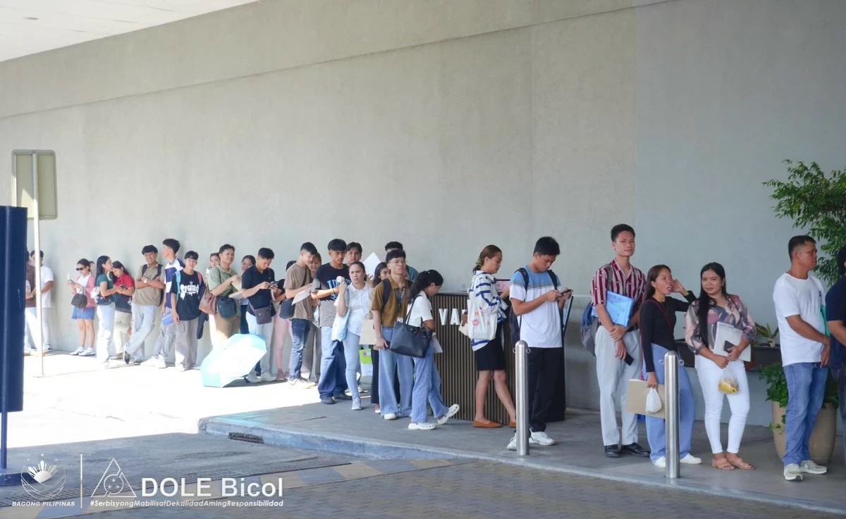 JOBSEEKERS line up during a June 12 job fair in the Bicol region. (DOLE Bicol FB)