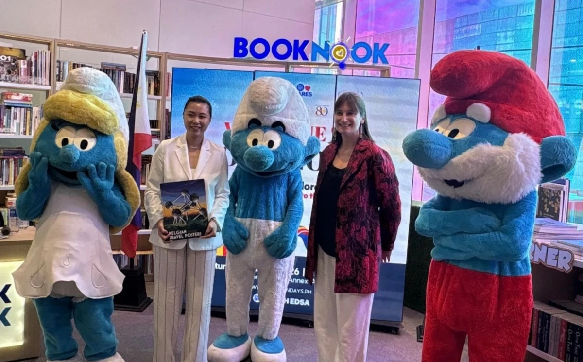The ceremonial turnover of Belgian books to the SM Book Nook underscores Belgium’s commitment to education and literacy. In photo: Architect Shereen T. Sy, Pioneer of Book Nook; Ambassador Vladislava Iordanova; and the Smurfs