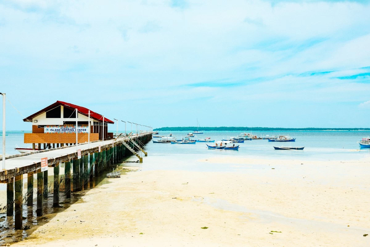 ISLAND GATEWAY Boats line up at the jump-off point for island-hopping adventures around Siargao (Photo: Magic Liwanag)