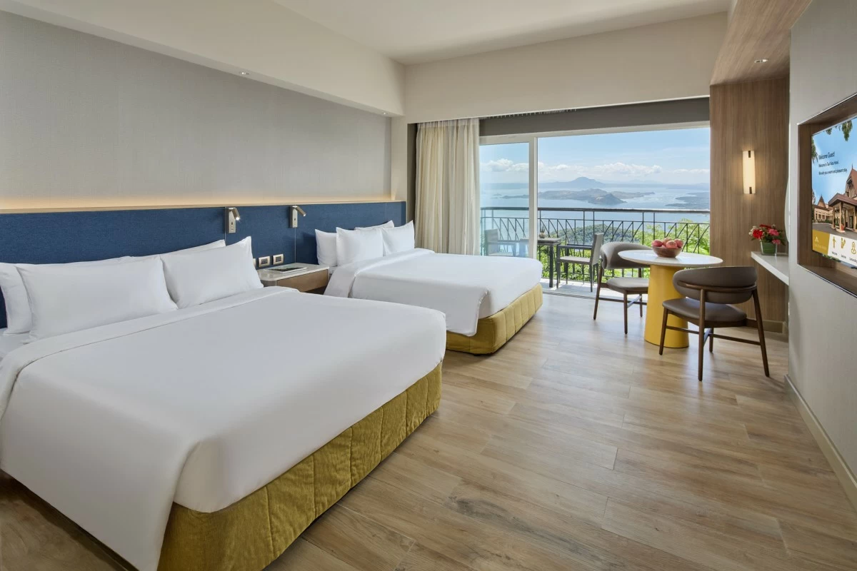 Celebrate Father's Day with more space to reconnect in the newly refreshed Premier Room, featuring two queen beds and contemporary comforts perfect for family stays.
