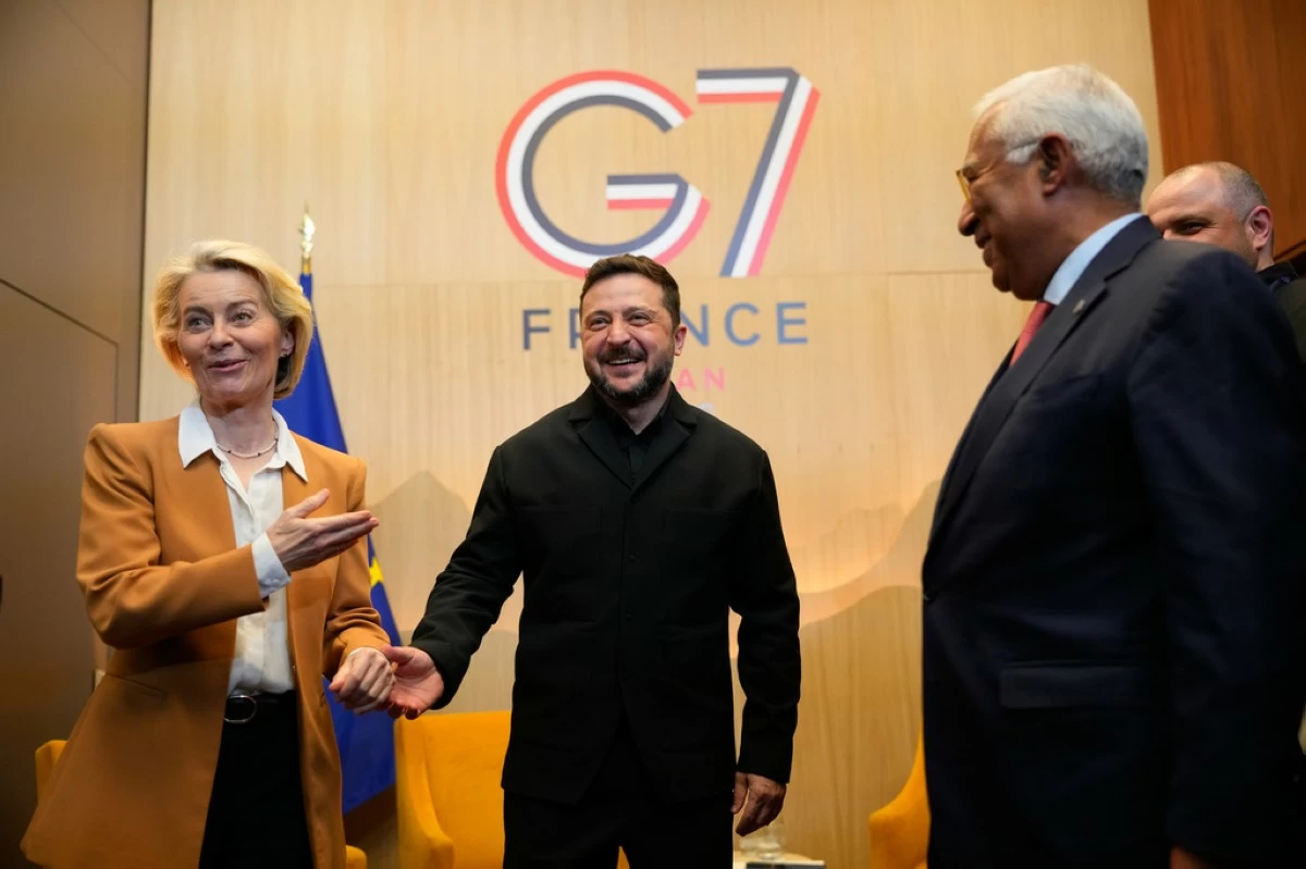 Ukrainian President Volodymyr Zelenskyy, center, meets with European Commission President Ursula von der Leyen, left, and European Council President Antonio Costa, right, at the G7 summit in Evian-les-Bains, France, Tuesday, June 16, 2026. (AP Photo/Vadim Ghirda)
