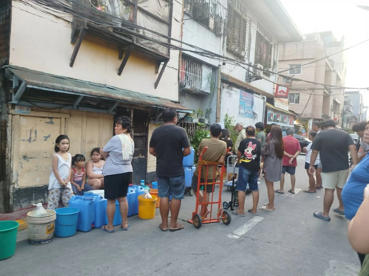 Residents of Barangay 511 queue with plastic containers along San Diego Street in Sampaloc, Manila, on June 17, 2026, to collect clean water from a community water pump. (Photo courtesy of Barangay 511)