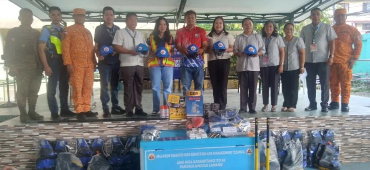 Malabon City officials turn over emergency response supplies as part of the city’s participation in the Second Quarter Nationwide Simultaneous Earthquake Drill. (Photo courtesy of Malabon PIO)